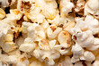 © Cynthia - popcorn background, closeup macro detail, snack food for movies and cinema