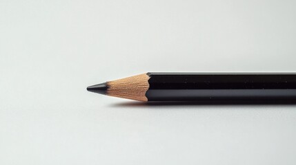 Poster - Simple pencil on flat surface in minimalistic studio setting