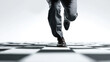 © jiratip - A person running on a chessboard, with an eye-level shot capturing their legs and feet, evoking themes of strategy and risk-taking
