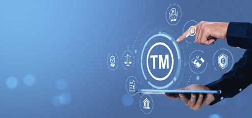 Poster - Trademark protection icons with businessman using tablet on blue background.