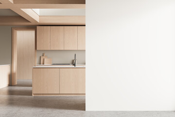 Poster - Minimalist kitchen interior with light wood cabinets and empty white wall for poster or artwork mockup template in clean modern home setting. 3D Rendering