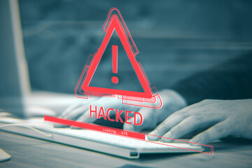Poster - Cybersecurity alert with red exclamation mark and hacking warning on virtual screen over hands typing at keyboard in office desktop environment.