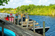© Delphotostock - Airboat docked at a wooden pier, Everglades touristic airboat ride and tour, Florida