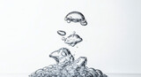 Captivating close-up of rising water bubbles on a clean white background studio shot