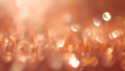 Poster - soft peach bokeh background with shimmering hexagonal light reflections and golden blur highlights for elegant web design, print template, or branding texture

