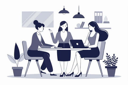 Three businesswomen collaborating around a table with laptop and engaging in team discussion