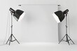© Kardus - Premium Quality Image of a Photo Studio with Two Lights on a White Background