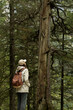 © Point of view - A hiker with a backpack in mountain , standing on a scenic viewpoint in the Tatra Mountains near Zakopane, Poland, during outdoor trekking adventure.