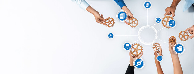 Poster - This image depicts a collaborative teamwork scene with diverse hands holding gears and icons, symbolizing business management, strategies, and innovative processes. Amity