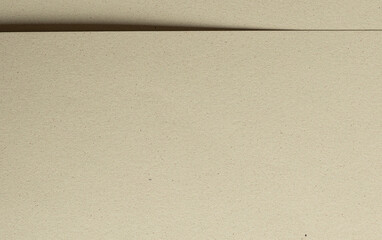 Aufkleber - Beige and green speckled recycled paper with a rough, raw texture. The muted, earthy tones offer a