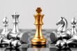 © Kazi - Gold chess king standing tall among fallen silver pieces