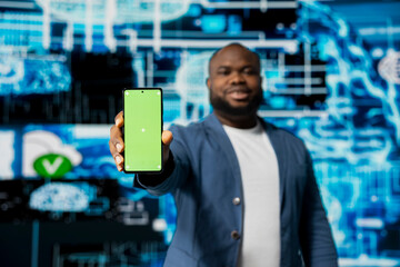 Poster - Black businessman using advanced technology and green screen on phone, exploring data science, automation and AI brain in a digital data visualization environment. Machine learning.