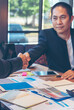 © aFotostock - Vertical Horizon Team Business Partners shaking hands together enterpreneur business meeting room. Vertical Shakehand teamwork partners handshake. Partnership mergers and acquisitions with copy space
