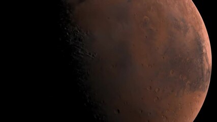 Wall Mural - view of the red planet mars, showing its dusty surface and dark markings from space.