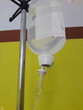 © SyarTok - A hanging IV bag is used to deliver fluids or medications into a patient's body through the blood vessels.