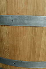 Poster - High-resolution image of a wooden barrel's textured surface and metal bands. Perfect for rustic designs.