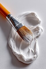 Poster - Paintbrush With White Paint on Canvas, Symbolizing Artistic Expression and Creative Inspiration for Marketing Campaigns : Generative AI