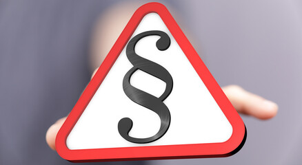 Poster - Stock photo of a hand holding a warning sign with a paragraph symbol. Perfect for legal, law, and warning concepts.