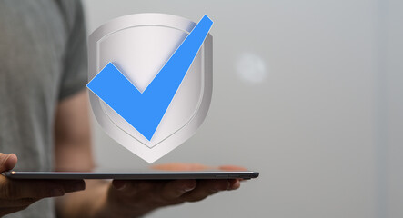 Aufkleber - Secure your data! Image of a digital shield and checkmark on a tablet.