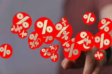 Poster - Red and gold percentage symbols floating in the air, ideal for sale and discount promotions.