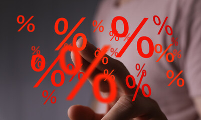 Poster - Red percentage symbols float around a hand, symbolizing discounts, interest rates, or sales.