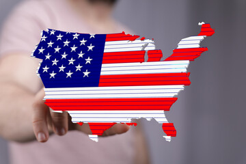 Aufkleber - Person interacting with a 3D model of the United States designed with the American flag.