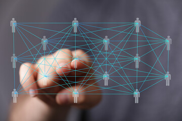 Leinwandbilder - Image of a hand interacting with a digital network of interconnected people. Represents global communication and collaboration.