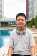 © Ranta Images - Teenage Boy at Poolside During Summer