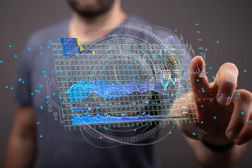 Poster - Stock photo of a person interacting with a holographic projection of data charts, graphs, and analytics.