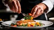 © riztasof - Chef plating salmon dish