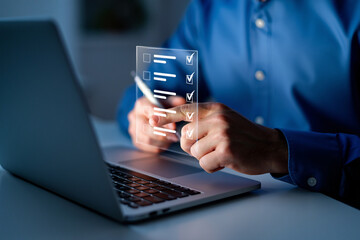 Poster - Man using laptop to complete digital checklist online task management