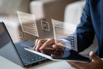 Poster - Businessman Using Tablet and Laptop with Holographic Interface Showing Data and UI Design