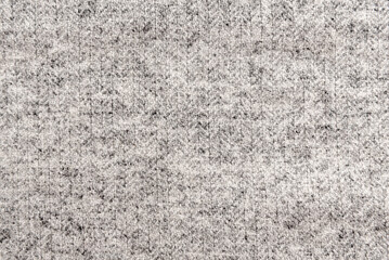 Texture of dense grey fabric for tailoring. Canvas. Textile. Textile