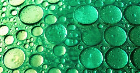 Aufkleber - Green liquid bubbles create abstract texture. Varying sizes, shapes suggest fluid dynamics, interesting patterns. Closeup view emphasizes detail.