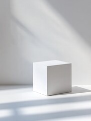 Poster - White cube on white background with sunlight shadows.