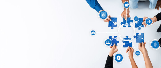 Poster - Hands coming together to solve puzzles symbolize teamwork in developing innovative security strategies for businesses. Ideal for themes of collaboration and technology. Amity