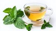 © widyastudio07 - Aromatic lemon balm tea in glass cup and fresh leaves isolated on white