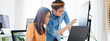 © Urbanscape - Asian male, female programming developer work together at home office, brainstorm discussion. Information technology, software engineer programmer coding job, man woman coworker teamwork. Copy space