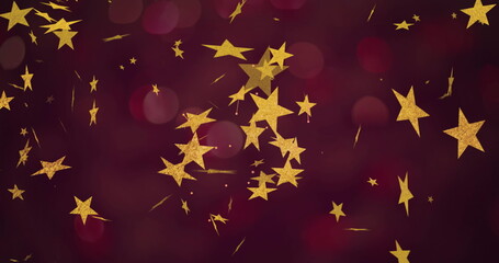 Poster - Shimmering gold star cluster drifting over burgundy-red backdrop, with bokeh and light streaks