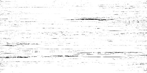 Poster - A close up view of a textured surface with pattern, Diagonal black and gray scratches or streaks on a lighter background, The texture resemble worn or scratched material such as painted design.