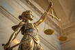 © Hawkeye.Creatix - A majestic golden statue of Lady Justice holding the scales of balance, symbolizing fairness, law, and impartiality.