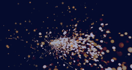 Poster - Radiating golden sparks fanning out in dark space, with sparkler creating star-shaped bokeh lights