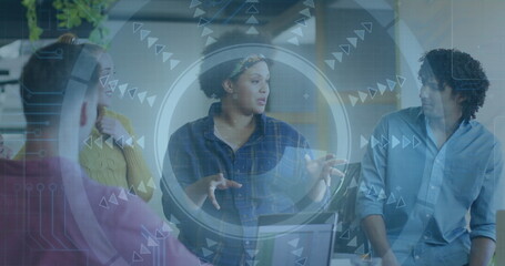 Poster - Presenting manager wearing blue shirt speaking in office meeting room with laptop digital overlay