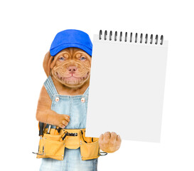 Aufkleber - Smiling Mastiff puppy wearing blue cap and denim overalls with tool belt shows empty list. Isolated on white background