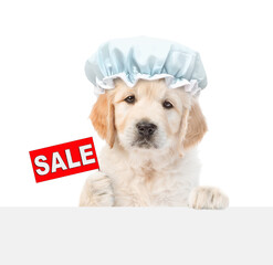 Aufkleber - Cute golden retriever puppy wearing shower cap shows signboard with labeled 