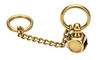 © FalghiStock - Detailed studio shot reveals a golden keychain with rings, chain and a cube pendant, isolated view.
