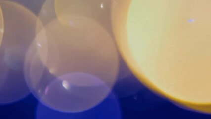 Poster - Abstract blurred circles and lights creating a dreamy background with vibrant colors and a soft focus effect for creative design projects and presentations 4k video footage