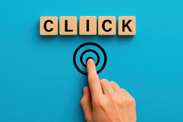 Poster - Engaging interaction with a pressing a target symbol beneath lettered blocks that prompt digital engagement
