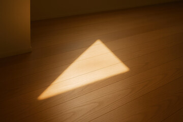 Poster - The warm sunlight projects a triangular beam onto a smooth wooden floor suggesting focus and clarity in a calm environment