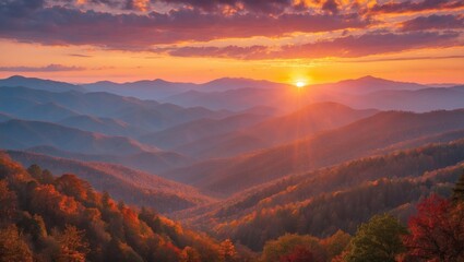 Poster - Vibrant fall dawn illuminating the misty mountain range